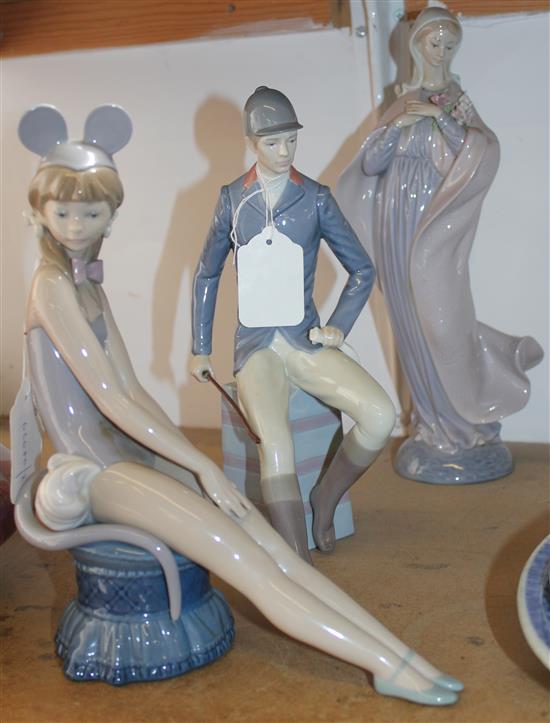 Lladro figure of a seated huntsman and two other figures